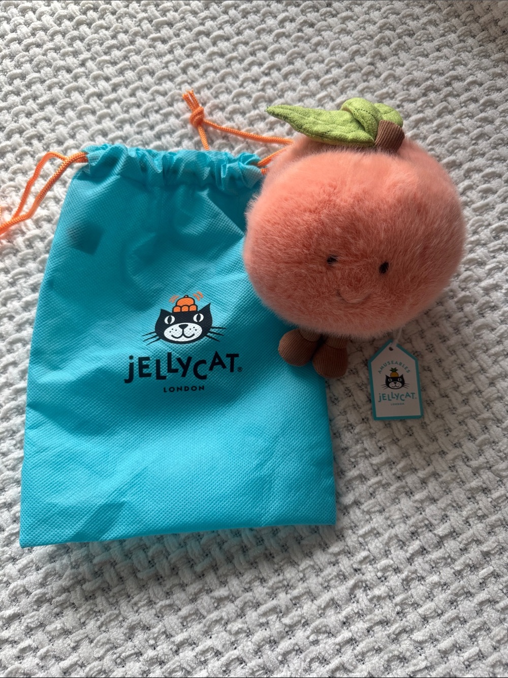Jellycat Coral Peach Plush Fruit Toy with Green Leaf